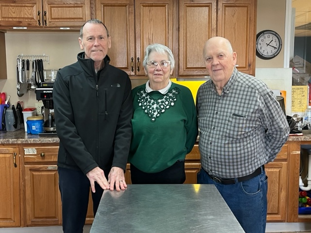 IV PADS Board Members, Tom Rooney, Pat Applebee, and Robert Hylin, who regularly prepare and serve meals at Ottawa PADS
