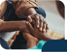 Hands offering comfort and support.