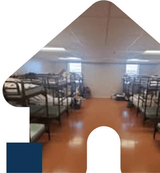 Bunk bed dormitory room, clean and organized.