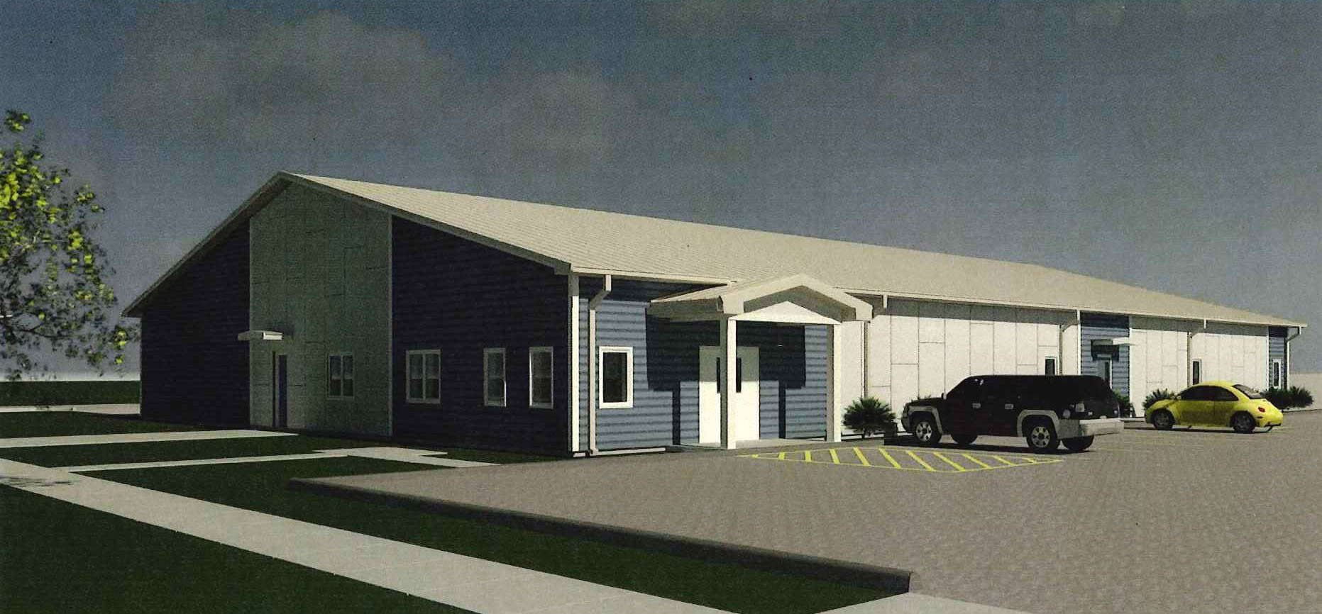 Modern building with parked cars outside