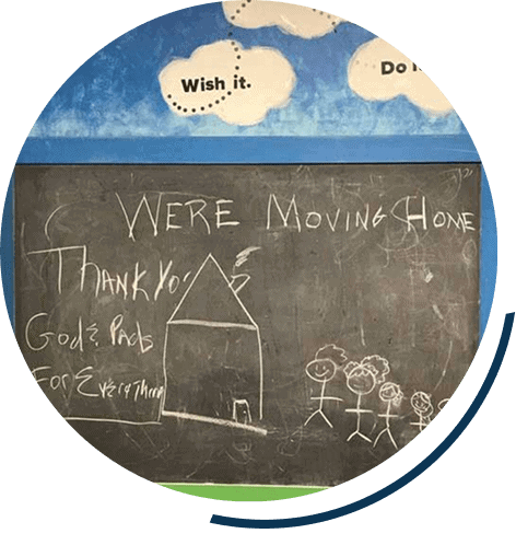 Chalkboard art announcing move home.