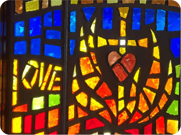 Colorful stained glass with love and heart design.